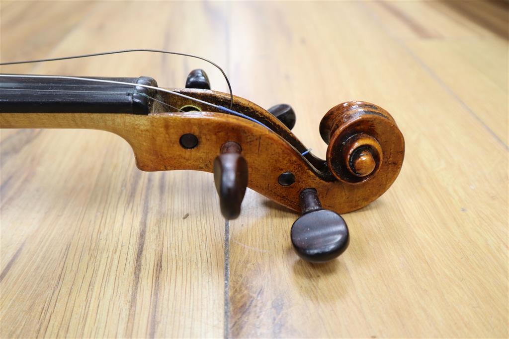 A 19th century Flemish? violin, length of back 35cm, cased with two bows